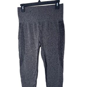 High-waisted gray sports leggings with a wide elastic band, size L